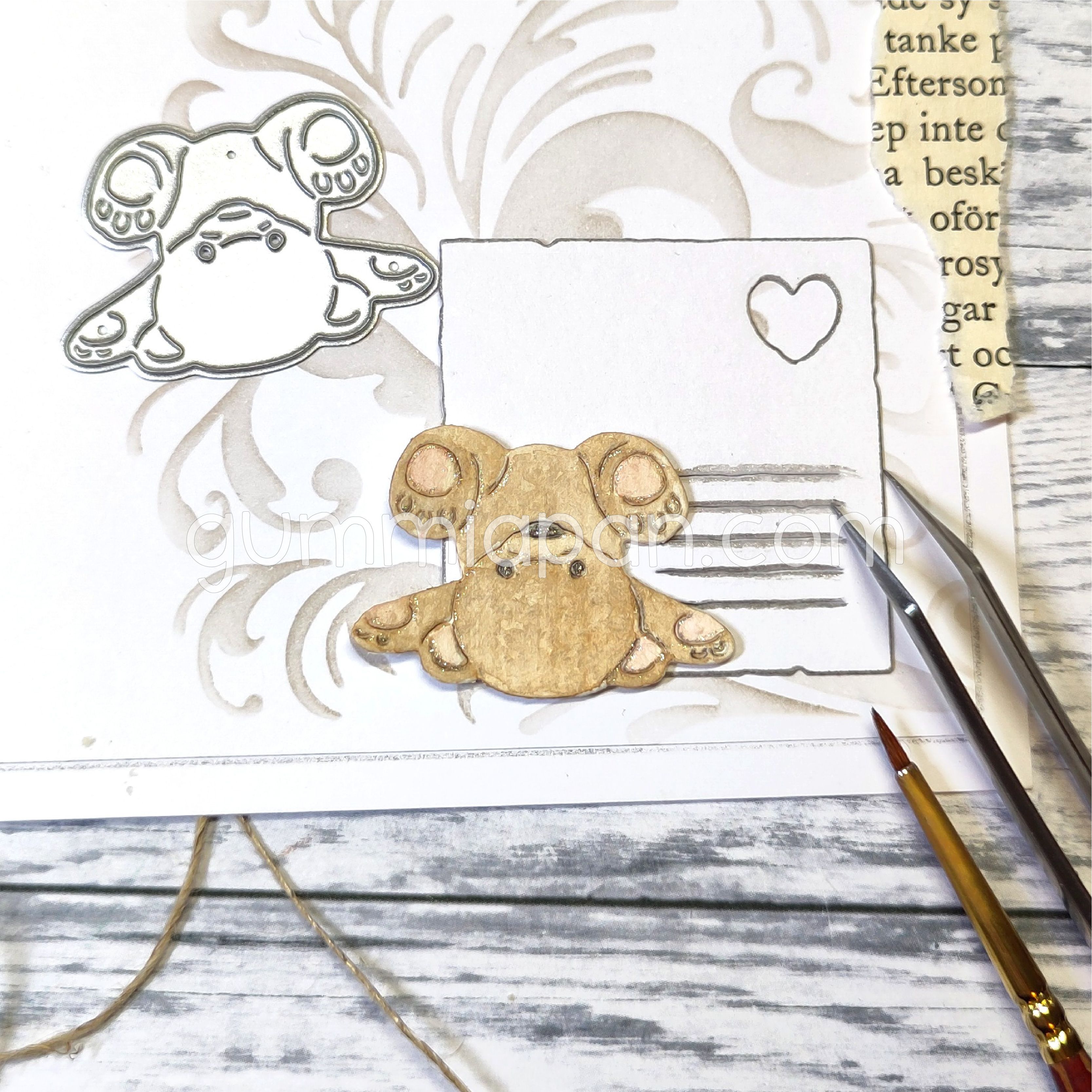 Gummiapan -  Teddybär auf seinem Rücken Gummiapan -  Teddybär auf seinem Rücken